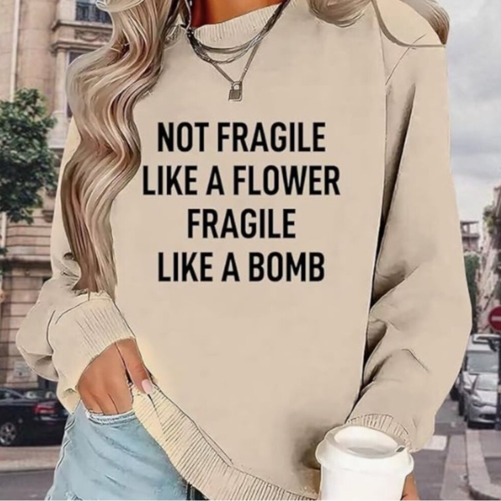 Not fragile like a flower, fragile like a bomb graphic crewneck